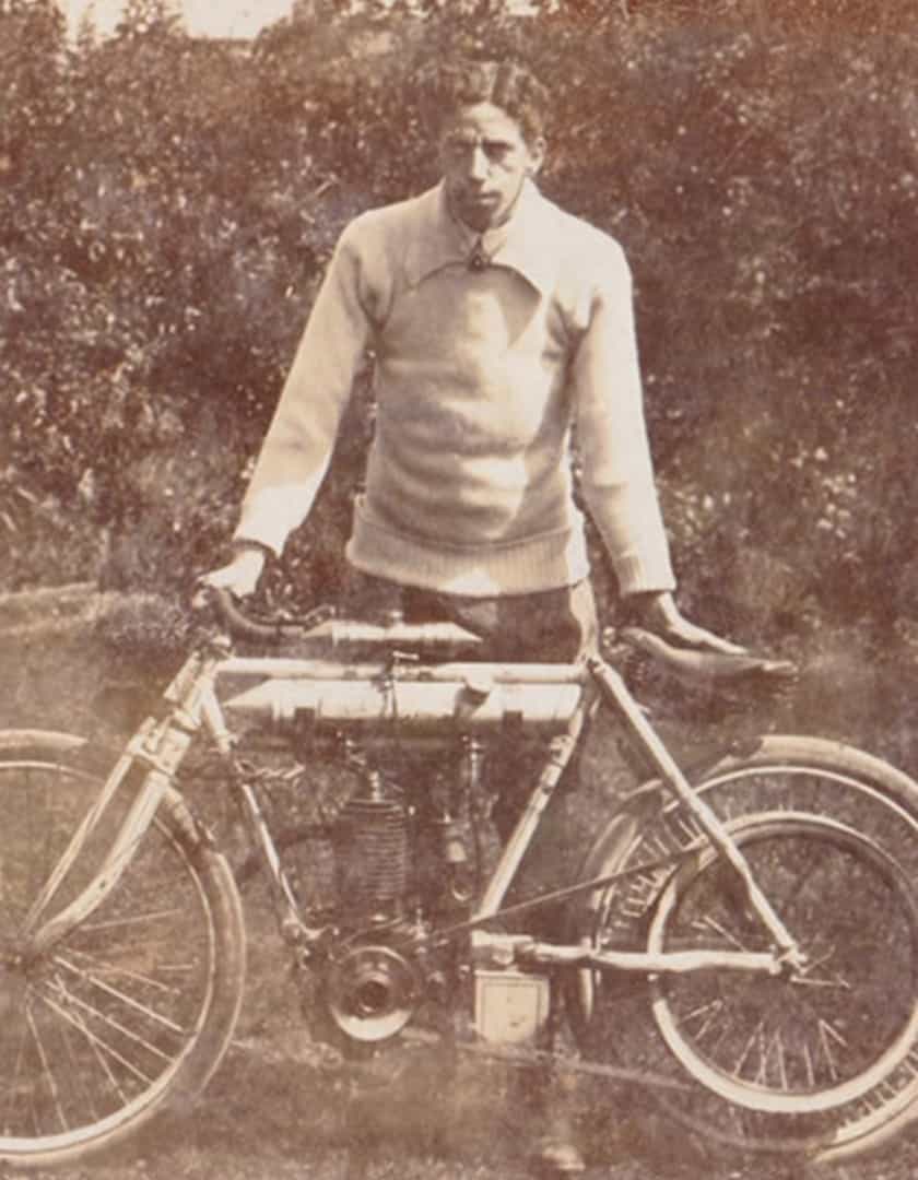 An image of Percy Wallis on of the founding brothers with his bike.